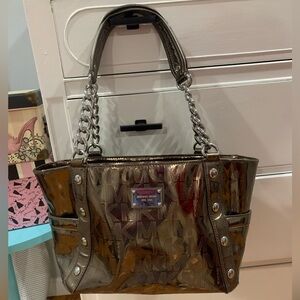 Michael Kors metallic bag with chain detail on the straps.